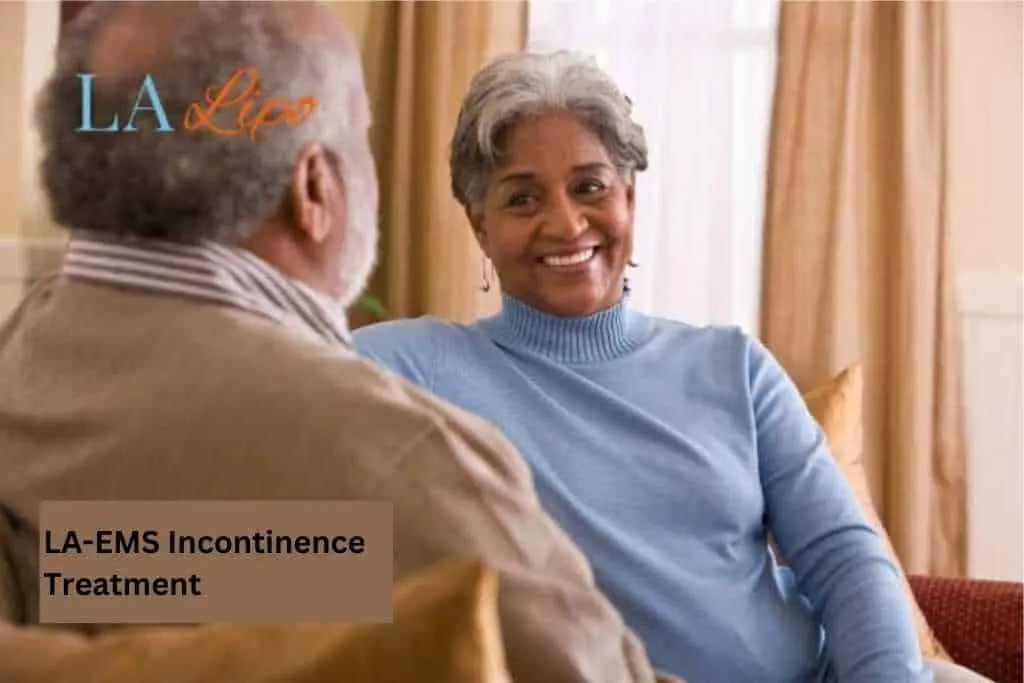 Couple sat smiling at each other - LA-EMS treatment Holme Chapel